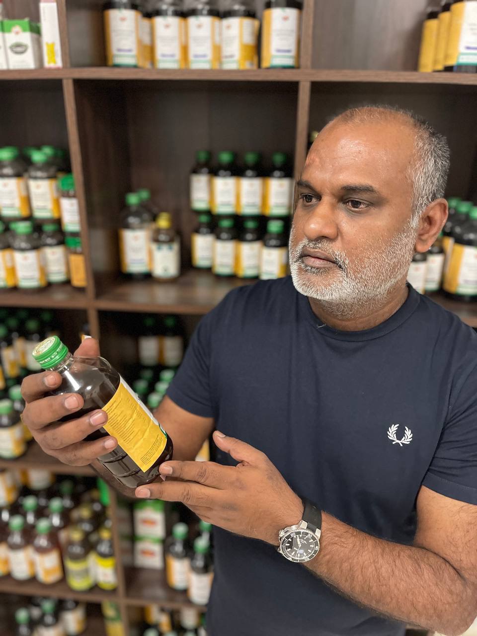 Vaidya Nithi Subramaniam in the practice dispensary